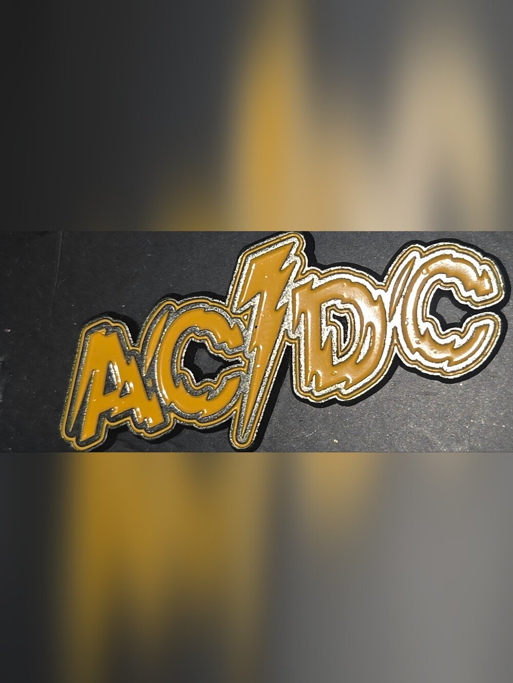 Vintage AC/DC Gold and Black Lightning Bolt Logo Pin